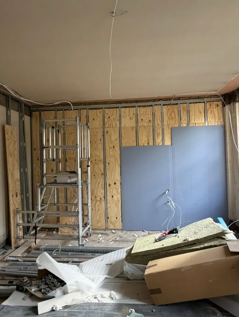 Stage 3: plywood and plasterboard going onto the frame