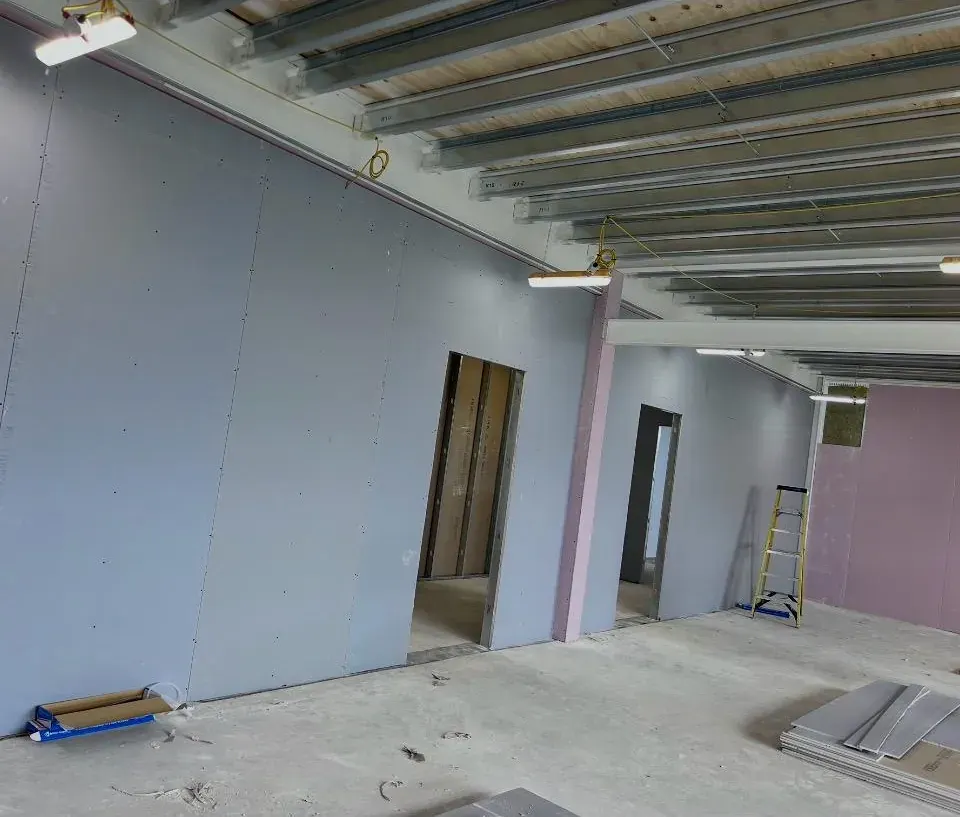 Plasterboarded walls with MF ceiling channels installed